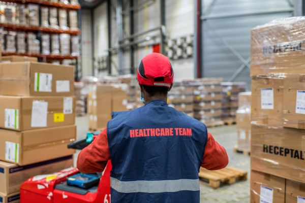 Healthcare logistics team handling pharmaceutical shipments at Port of Antwerp-Bruges
